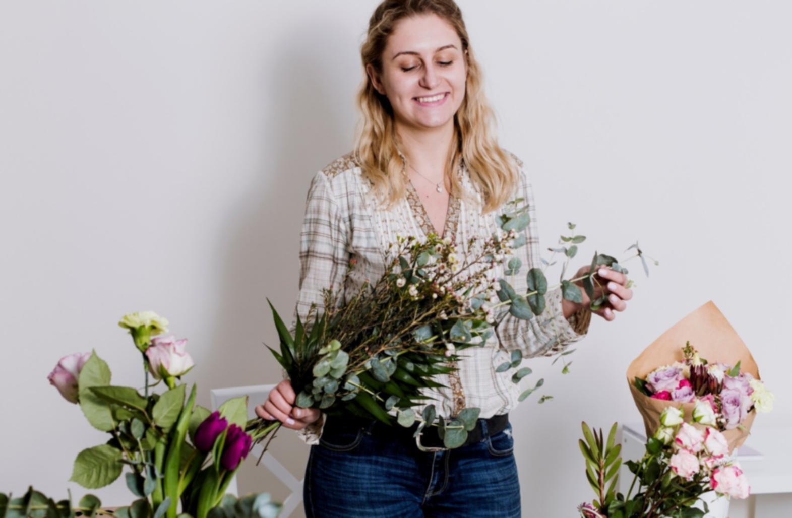 Learners working on flower attachment assignments